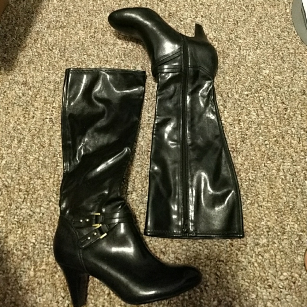 Tall black heeled boots